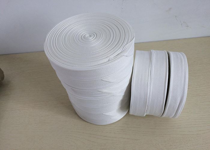 Heat shrinking fabric wrap tape roll